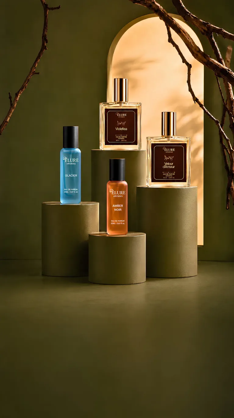 Élure Aromas fragrance bottles in warm editorial light